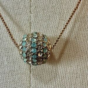 Gold tone green rhinestone bead pendant necklace
